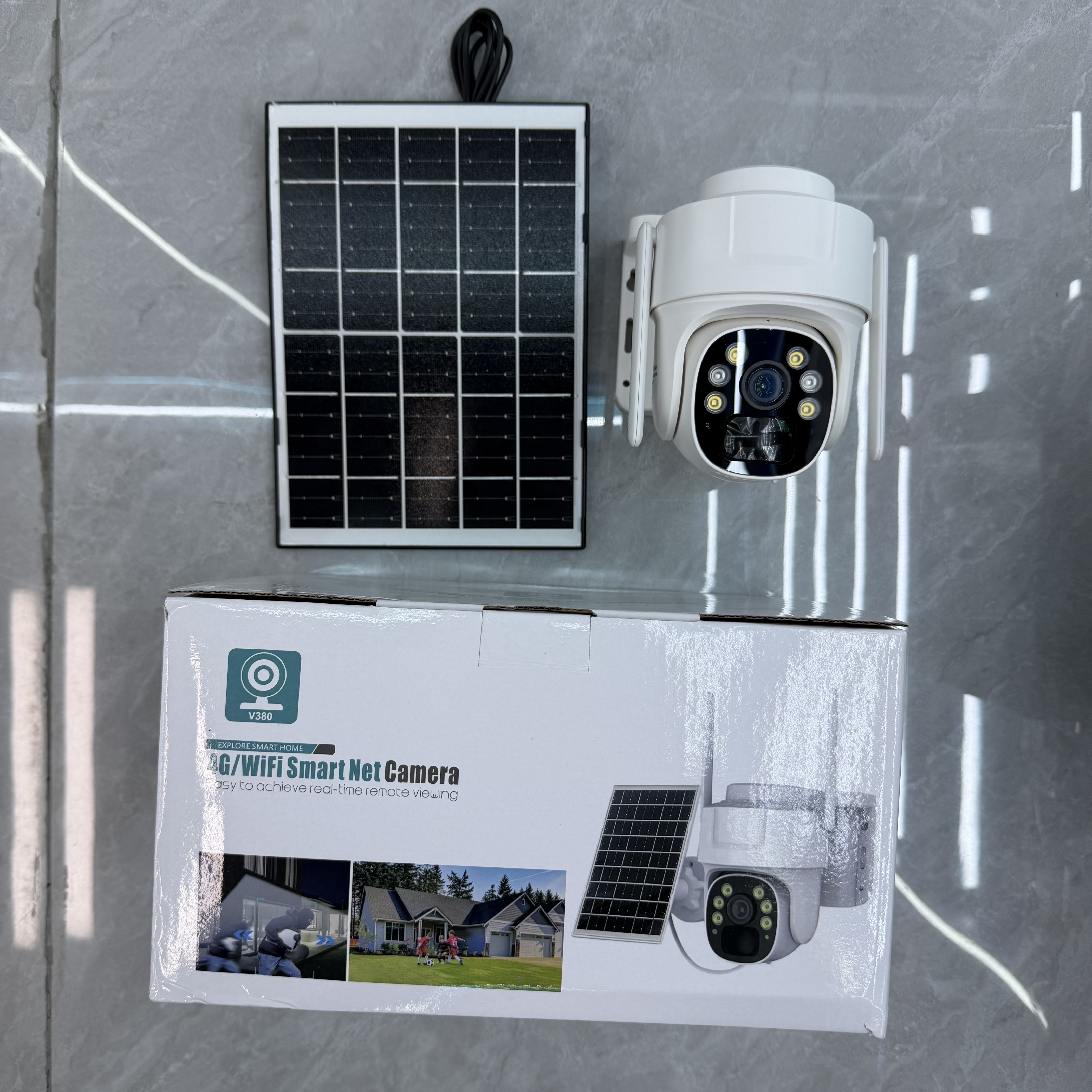 White solar camera and V380 box