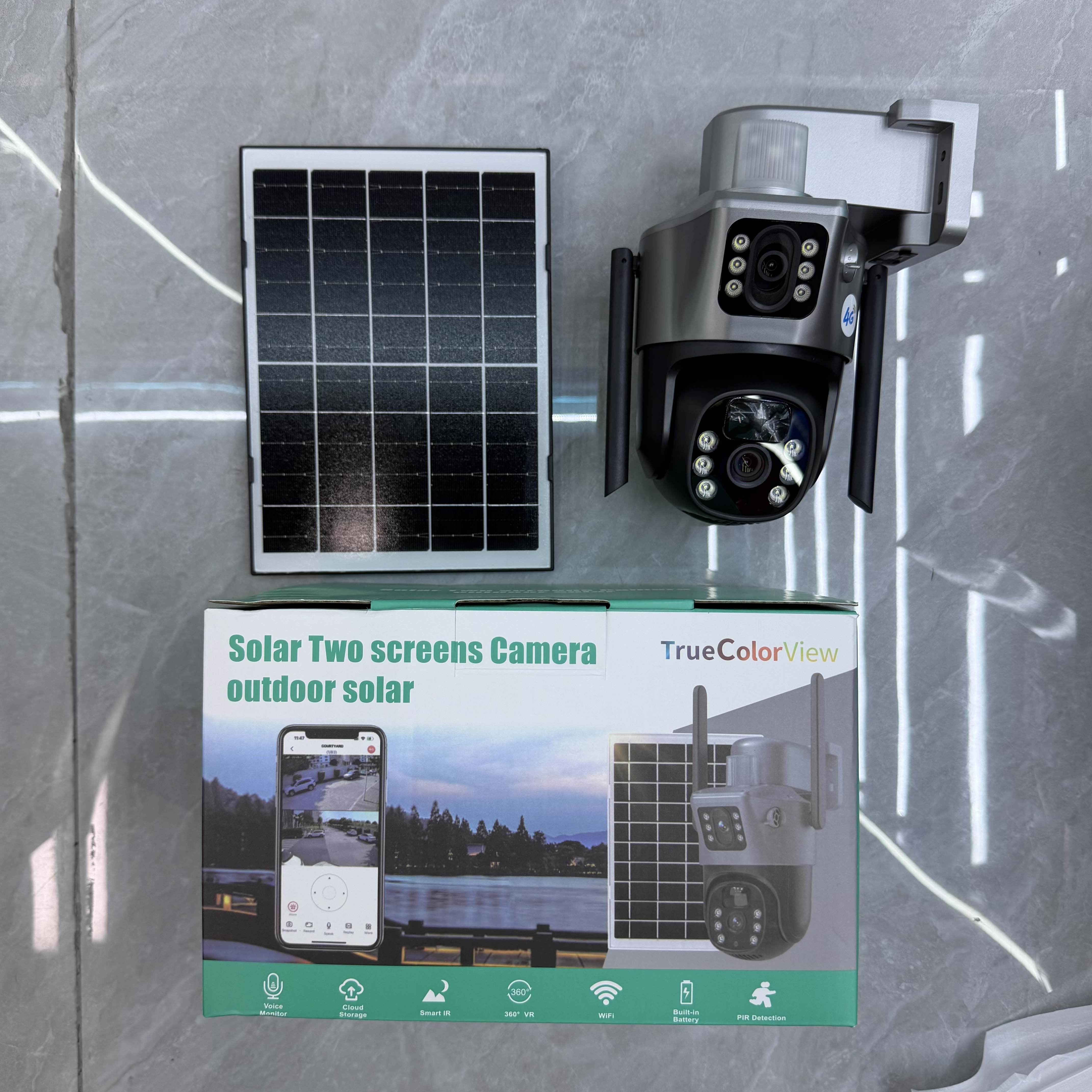 Silver solar camera and retail box