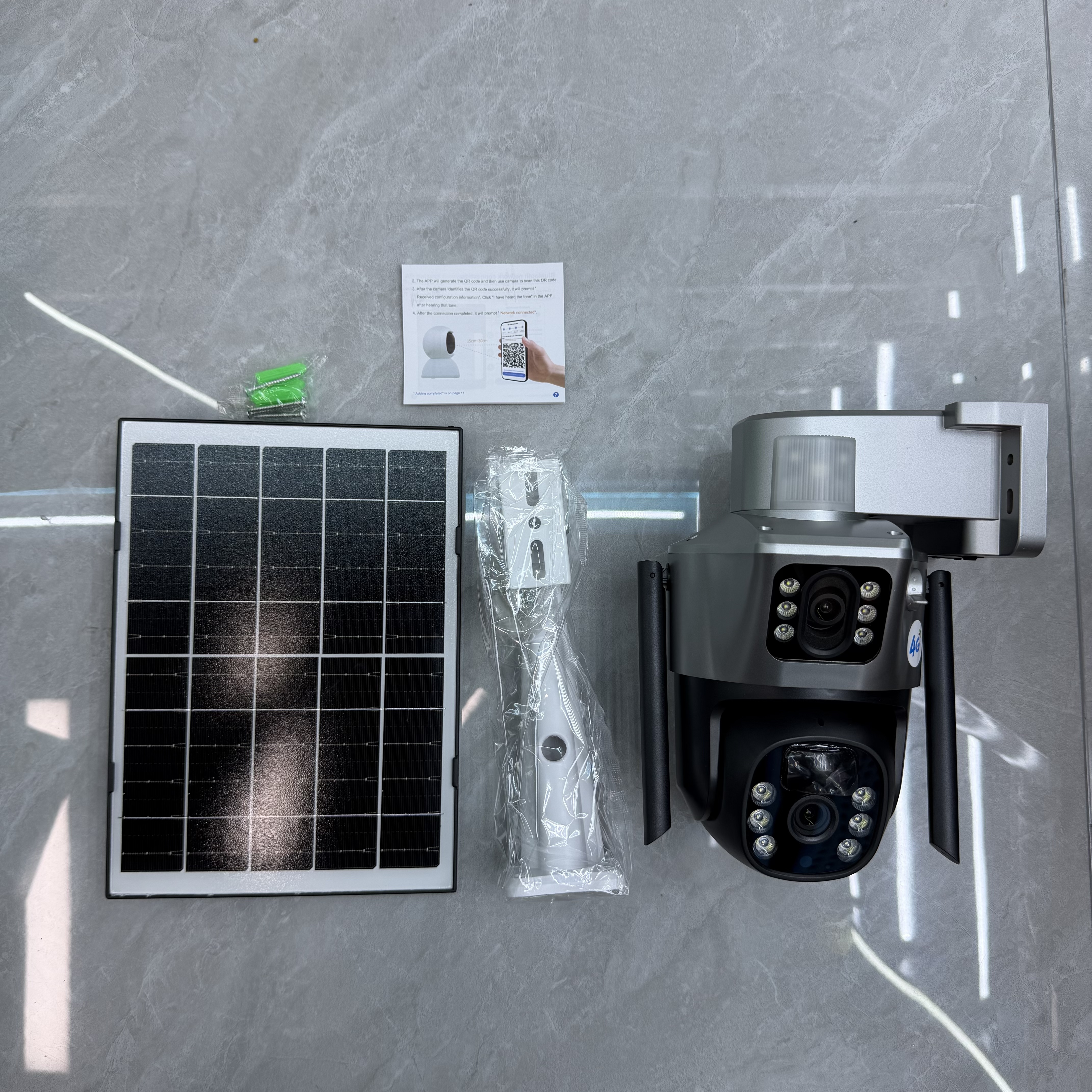 Silver solar camera with mounting rail